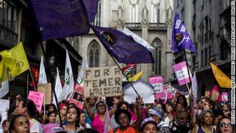 Several feminist groups protest against the Michel Temer government during a march on Women&#39;s Day on March 8, 2017 in Sao Paulo, Brazil.  