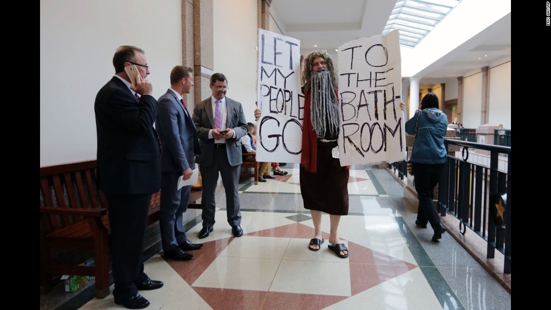 John Erler protests at the Texas state capitol on Tuesday, March 7, as a state Senate committee &lt;a href=&quot;http://www.cnn.com/2017/03/08/politics/texas-bathroom-bill/&quot; target=&quot;_blank&quot;&gt;began hearings about Senate Bill 6,&lt;/a&gt; legislation that would require all Texans to use the bathroom that corresponds to the sex on their birth certificates when they&#39;re in public schools and government-funded buildings. Critics argue the bill unfairly discriminates against transgender people. Supporters say the bill would protect women and children and give them privacy and that it isn&#39;t intended to target any group.