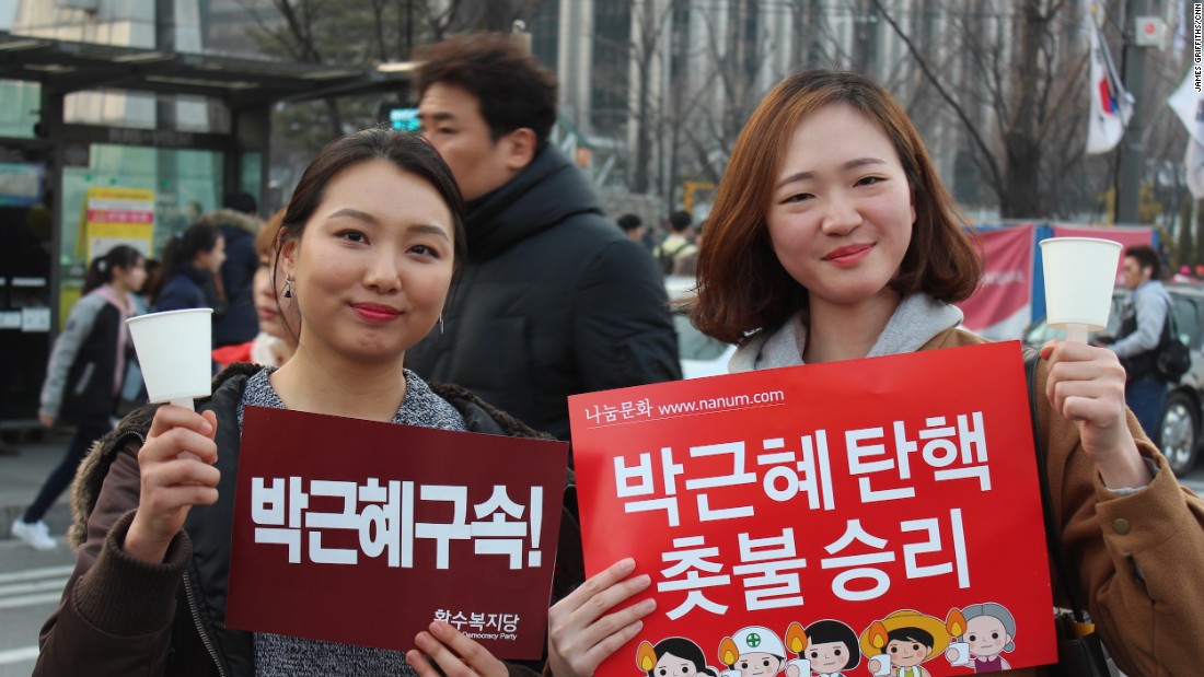 &quot;Today is just the beginning,&quot; said Kim Ga-hyun, 26 (left). Her friend Kim Bo-hee, 24, said that after months of protests, it was good to have a &quot;day of celebration.&quot; 