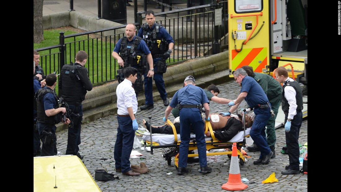 Masood is treated by emergency services as police look on at the scene outside the Houses of Parliament. The Metropolitan Police say he was born in Kent, but is believed to have been living in the West Midlands recently. Police say Masood was also known by a number of aliases. &quot;Masood was not the subject of any current investigations and there was no prior intelligence about his intent to mount a terrorist attack,&quot; Met Police said in a statement.