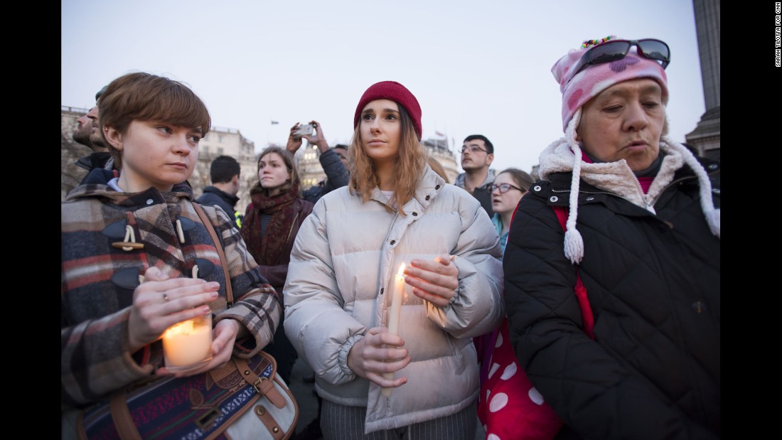 A crowd gathers in Trafalgar Square on Thursday, March 23, for a candlelit vigil to honor the victims of Wednesday&#39;s attack near Parliament in London. Emily Nye, a 21-year-old student at Goldsmiths, University of London, (center) says she was &quot;devastated, but not surprised&quot; to hear of the rampage.