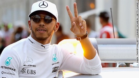 Polesitter Lewis Hamilton celebrates after taking top spot on the grid for Mercedes at Albert Park