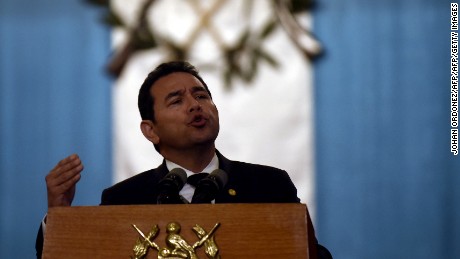 Guatemalan President Jimmy Morales speaks during a press conference at the Culture Palace in Guatemala City on March 9, 2017, where he informed about the temporary closure of the government-run children's shelter in San Jose Pinula, east of the capital where a fire took place on the eve leaving, up to now, 34 girls dead. 
Guatemala recoiled in anger and shock Thursday at the deaths of 34 teenage girls in a fire at a government-run shelter where staff have been accused of sexual abuse and other mistreatment. Around 20 more survivors remained hospitalized, most of them in critical condition, according to hospital officials. / AFP PHOTO / JOHAN ORDONEZ        (Photo credit should read JOHAN ORDONEZ/AFP/Getty Images)
