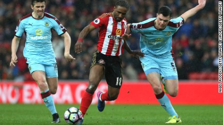 England internationals Jermain Defoe (center) and Michael Keane (right) in action during Sunderland&#39;s Premier League clash with Burnley.