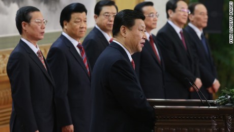 Zhang Gaoli (L) stands with the other six members of the Chinese Communist Party's Politburo Standing Committee inside the Great Hall of the People in Beijing on November 15, 2012.