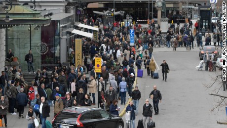 Police evacuate Stockholm Central Train Station after a truck crashed into a department store injuring several people in Stockholm, Sweden, Friday April 7, 2017. (Anders Wiklund/ TT News Agency via AP)