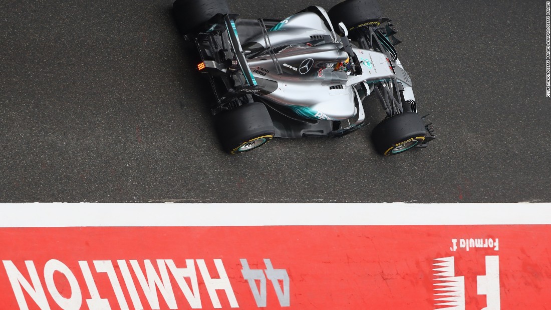 Lewis Hamilton passes through the pit lane at the Chinese Grand Prix.