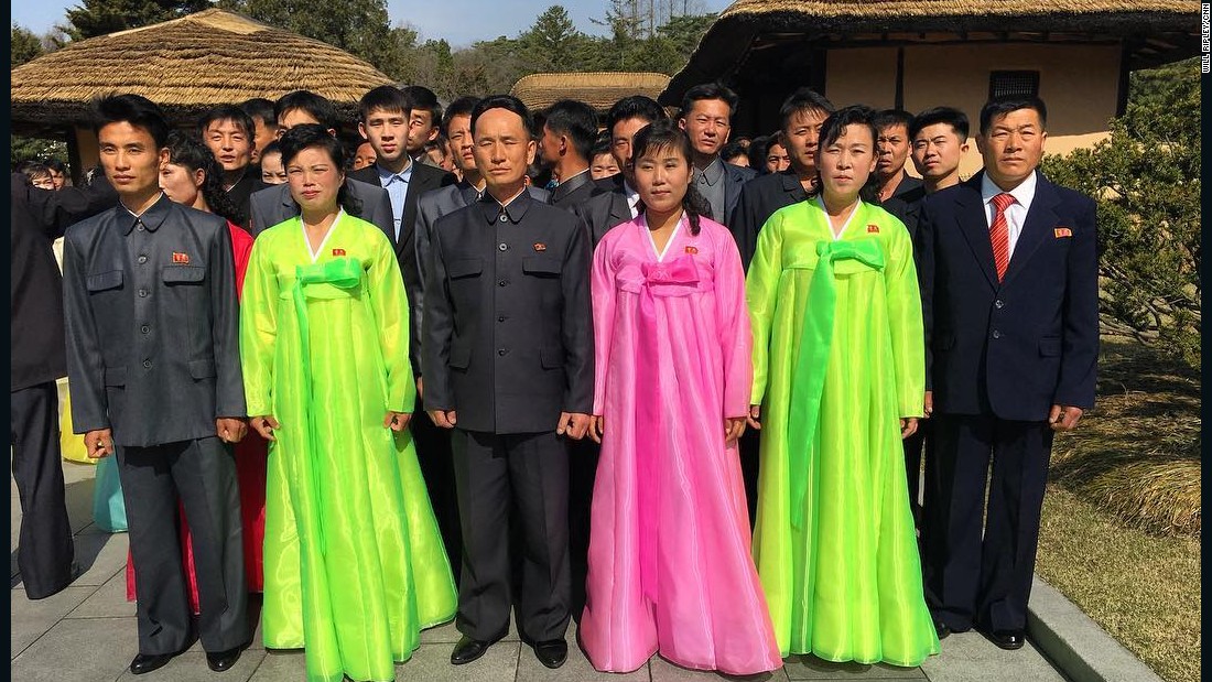 North Koreans pose on April 9, for a photo at Mangyongdae, the birthplace of Kim Il Sung.