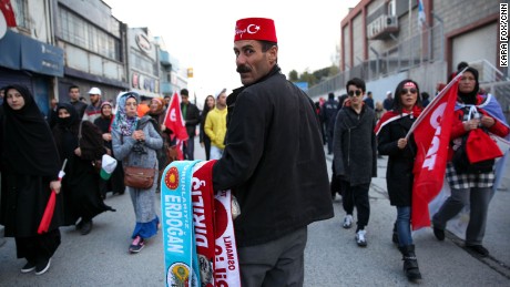 A vendor selling scarves with President Tayyip Erdogan&#39;s name on them at a rally for the &quot;yes&quot; vote in Istanbul&#39;s Yenikapi Square on Saturday, April 8, 2017. 