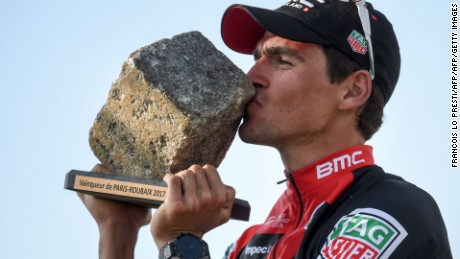 Greg Van Avermaet kisses his cobble trophy after winning the Paris-Roubaix one-day classic cycling race.
