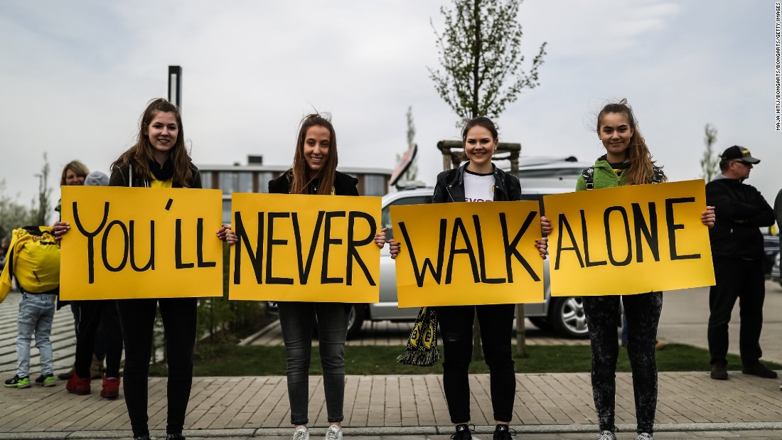 Outside Dortmund&#39;s training ground Wednesday, four fans held a sign in support of their team which read &quot;You&#39;ll Never Walk Alone&quot; -- which is the title of the club&#39;s anthem. 
