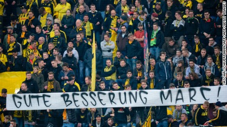Dortmund fans displayed a banner reading &quot;Get well Marc&quot; in the stands to their injured Spanish defender