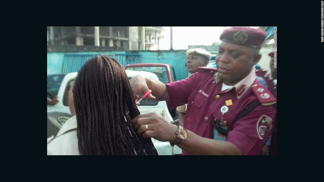 Nigerian official cuts off female employees' hair extensions | CNN