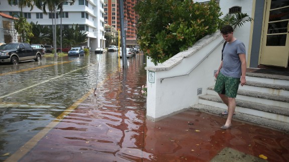 A flooded street in Miami Beach in September 2015. The flood was caused by a combination of seasonal high tides and what many believe is a rise in sea levels due to climate change. Miami Beach has already built <a href="http://edition.cnn.com/2016/02/29/opinions/sutter-miami-beach-survive-climate/index.html">miles of seawalls</a> and has embarked on a five-year, $400 million stormwater pump program to keep the ocean waters from inundating the city.