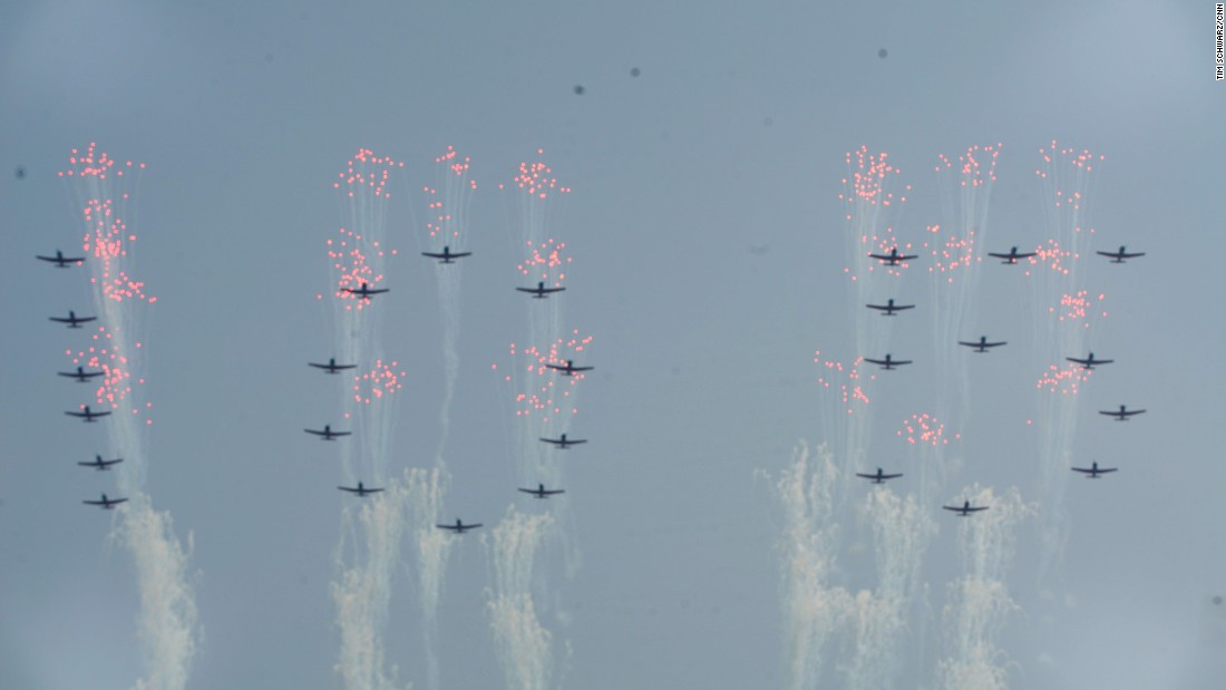 North Korean air force jets fly over the Pyongyang celebration.