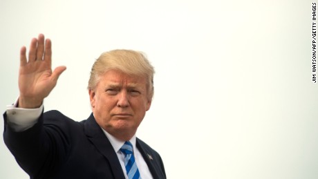 US President Donald Trump boards Air Force One at Andrews Air Force Base, Maryland, April 13, 2017. 