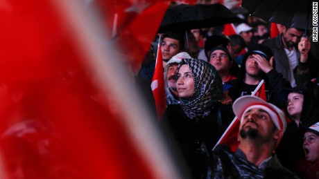 Turks celebrate at AKP headquarters in Ankara as the early results indicate a win for the &quot;yes&quot; ballots. 