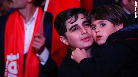 Turkish youths celebrate in Ankara moments after preliminary results showed a &quot;Yes&quot; win. 