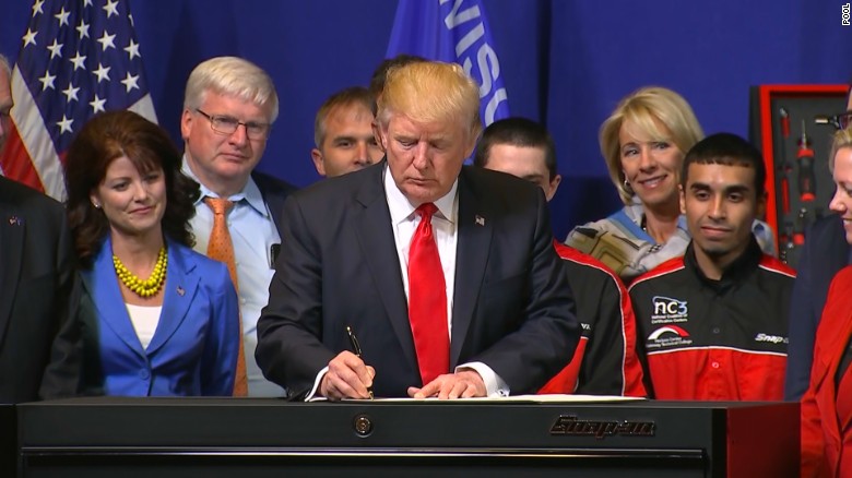 Trump signs executive order in Wisconsin