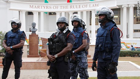 Policemen stand guard in front of Ghana&#39;s Supreme Court on August 29 in Accra.