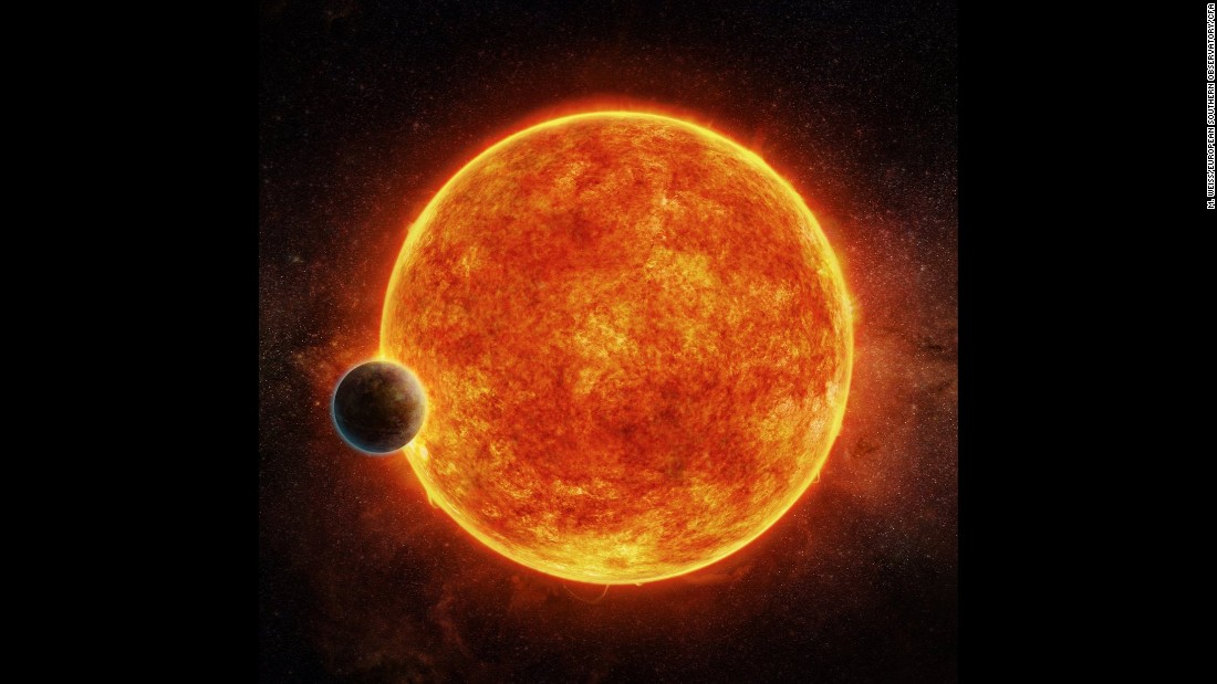 LHS 1140b is located in the liquid water habitable zone surrounding its host star, a small, faint red star named LHS 1140. The planet weighs about 6.6 times the mass of Earth and is shown passing in front of LHS 1140. Depicted in blue is the atmosphere the planet may have retained.