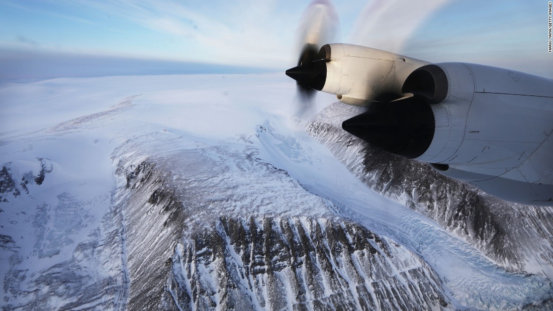 A NASA research aircraft flies over retreating glaciers on the Upper Baffin Bay coast of Greenland. Scientists say the Arctic is one of the regions hit hardest by climate change.  