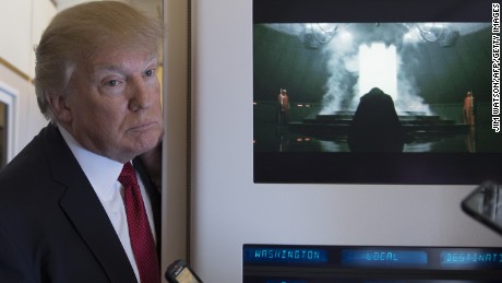 US President Donald Trump speaks to the press on Air Force One on April 6, 2017.
Chinese President Xi Jinping touched down in Florida Thursday for a first face-to-face meeting with President Donald Trump, hoping that a basket full of &quot;tweetable&quot; deals will help avoid a public clash.Trump had yet to arrive to Florida, but the pair will gather later at his Mar-a-Lago resort -- which the US president likes to call the &quot;Winter White House&quot; -- for what promises to be a masterclass in studied informality. / AFP PHOTO / JIM WATSON        (Photo credit should read JIM WATSON/AFP/Getty Images)