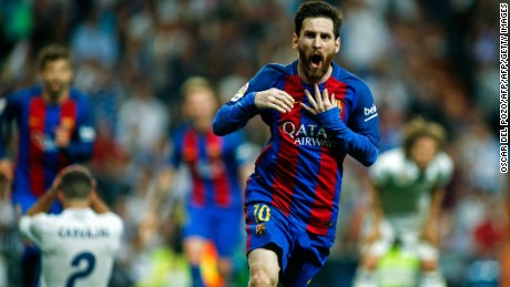 Barcelona&#39;s Argentinian forward Lionel Messi celebrates after scoring during the Spanish league Clasico football match Real Madrid CF vs FC Barcelona at the Santiago Bernabeu stadium in Madrid on April 23, 2017. / AFP PHOTO / OSCAR DEL POZO        (Photo credit should read OSCAR DEL POZO/AFP/Getty Images)