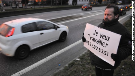 Gilles Latraye, a 57 year-old job-seeker, resorted to begging for a job by the side of a highway last year. 