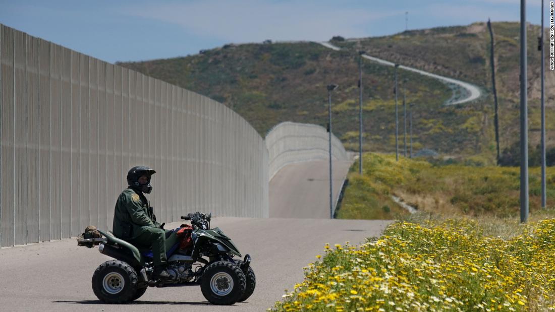 A Border Patrol agent keeps watch at the US-Mexico border at San Ysidro, California, in April 2017.