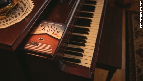A song book titled "If my People: A Prayer Guide for our Nation" is seen on the piano in the home of Joan Fleming in Advance, North Carolina, on Thursday, April 20, 2017. Fleming, a Republican organizer, fears that welcoming immigrants is welcoming crime. "If you don't have law and order, what do you have?" says Fleming, who is active in trying to convince city officials of nearby Winston-Salem not to give the city the "Welcoming City" title.
Mike Belleme for CNN