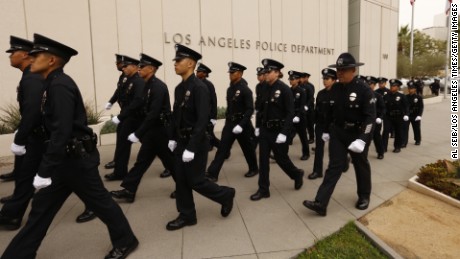 LAPD recruits march in processional as the Los Angeles Police Department holds a graduation ceremony led by LAPD Chief Charlie Beck and Mayor Eric Garcetti. 