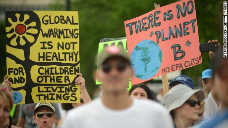 WASHINGTON, DC - APRIL 29:  People gather near the U.S. Capitol for the People&#39;s Climate Movement before marching to the White House to protest President Donald Trump&#39;s enviromental policies April 29, 2017 in Washington, DC. Demonstrators across the country are gathering to demand  a clean energy economy. (Photo by Astrid Riecken/Getty Images)