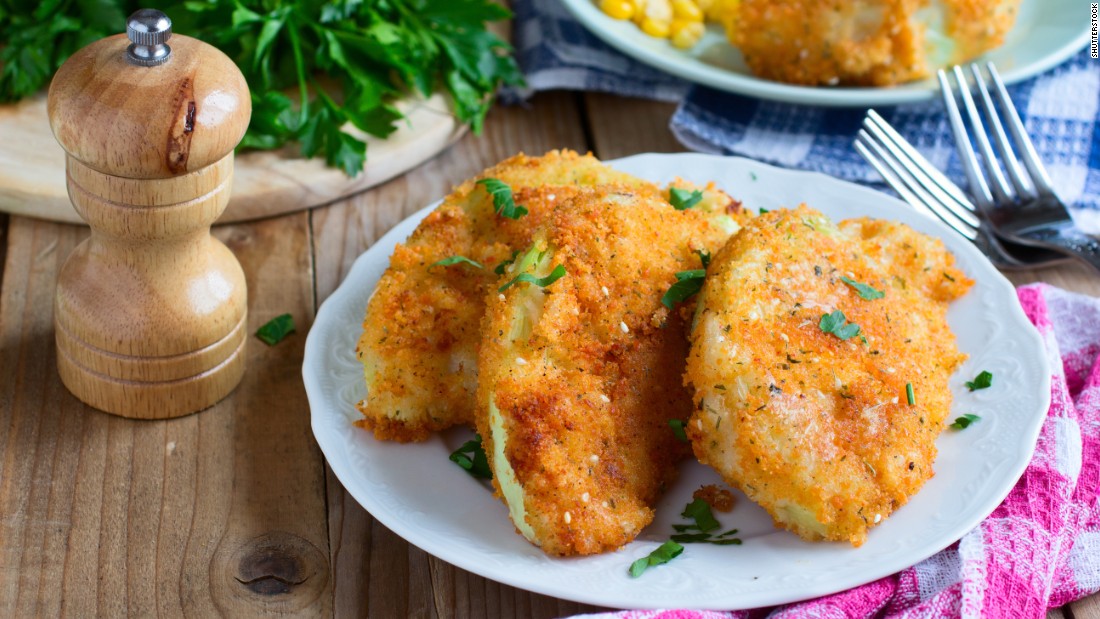 Fried cabbage with bread crumbs -- the vegan version of traditional German schnitzel -- looks just like its meat counterpart but with healthier ingredients.