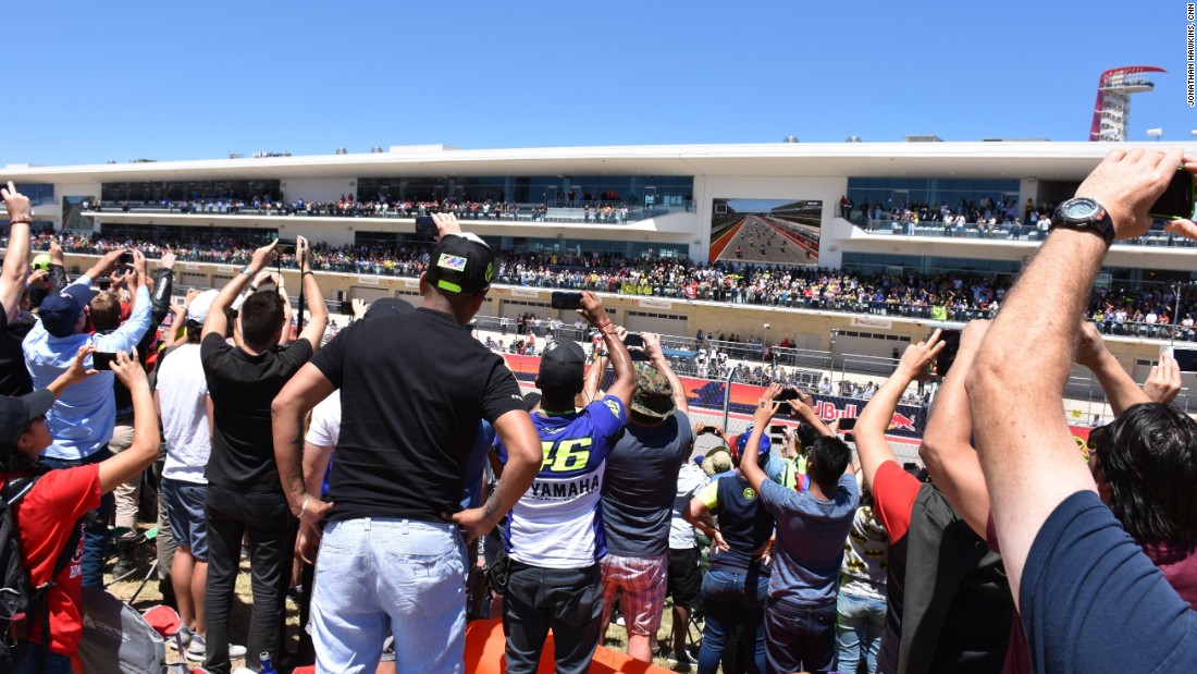 Crowds jostle for a glimpse of the MotoGP starting grid in Austin.