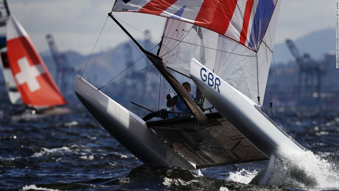 Mason describes the image of Scott&#39;s elation as &quot;one the nicest, cleanest&quot; he&#39;s ever taken -- telling CNN Sport  the ultimate aim is always &quot;a picture that tells a story with a key moment, key athlete and beautiful light.&quot;  But sometimes it&#39;s about pure action. Here, a member of the Nacra 17 Olympic fleet fights with testing winds on the Rio waters.  