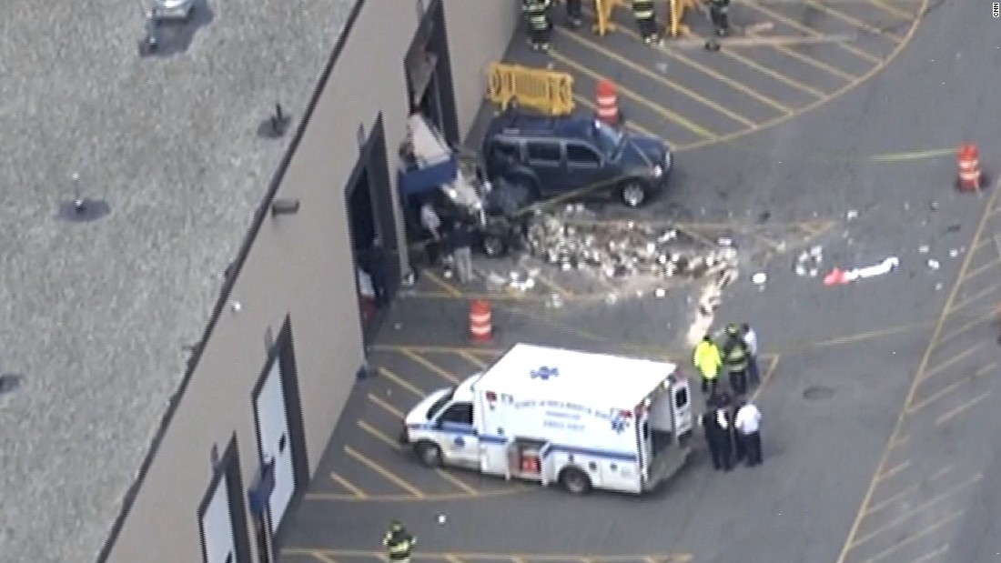 3 killed as driver plows into crowd at auto auction