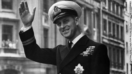 Prince Philip, Duke Of Edinburgh, waving through the open roof of a car on May 1948. 