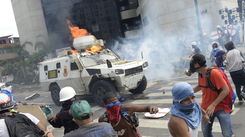 Moment armored vehicle mows down protesters