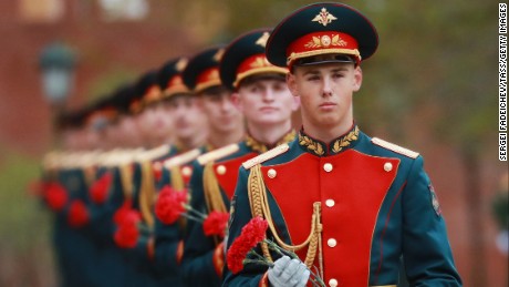 The Russian Honor guard get ready to lay flowers at the Tomb of the Unknown Soldier on Tuesday. 