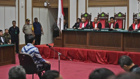 Ahok sits on the defendant&#39;s chair as he attends his sentencing hearing in Jakarta on May 9.