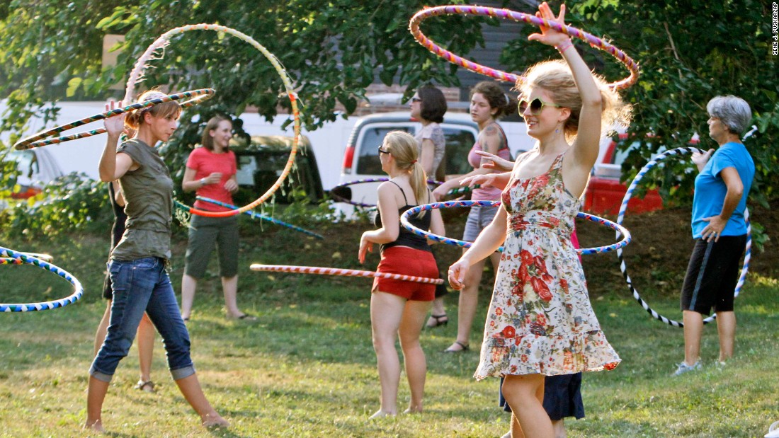 Stephanie Moser, second from right, hoops during an evening hooping class in Pittsburgh. Hula hooping has become hip again, with clubs across the US bringing together hoop aficionados and DVDs incorporating hoops as a way to fight obesity.    