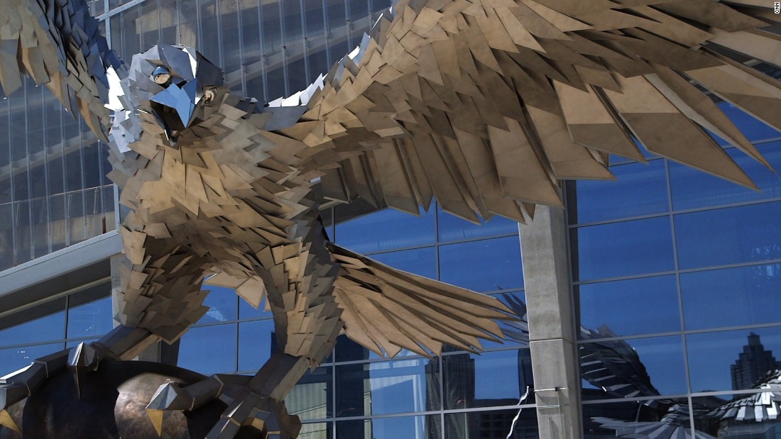 A giant stainless steel falcon is rising up in front of Mercedes-Benz  Stadium - Atlanta Magazine