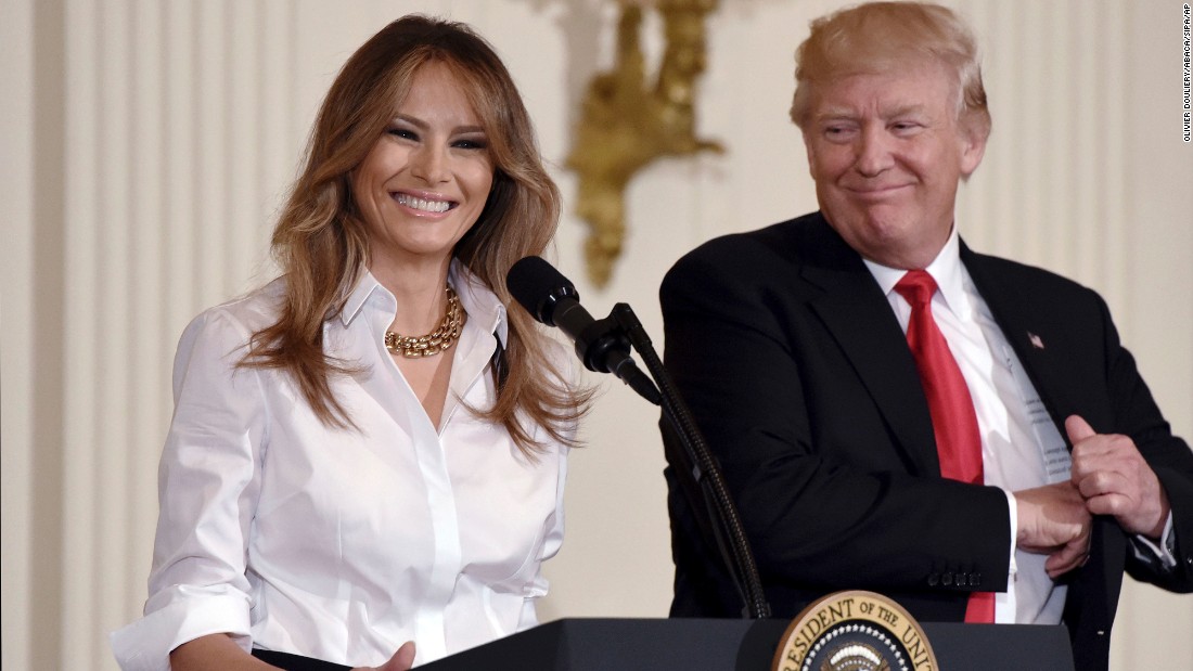 Melania Trump is joined by her husband as she speaks at a Mother&#39;s Day event at the White House.