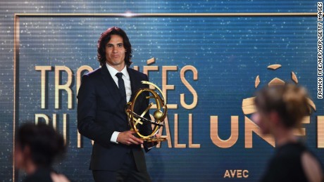 Paris Saint Germain forward Edinson Cavani reacts after receiving the French players' Ligue 1 Player of the Year award during the 26th edition of the UNFP (French National Professional Football players' Union) trophies ceremony at the Pavillon d'Armenonville in Paris, on May 15, 2017. / AFP PHOTO / FRANCK FIFE        (Photo credit should read FRANCK FIFE/AFP/Getty Images)