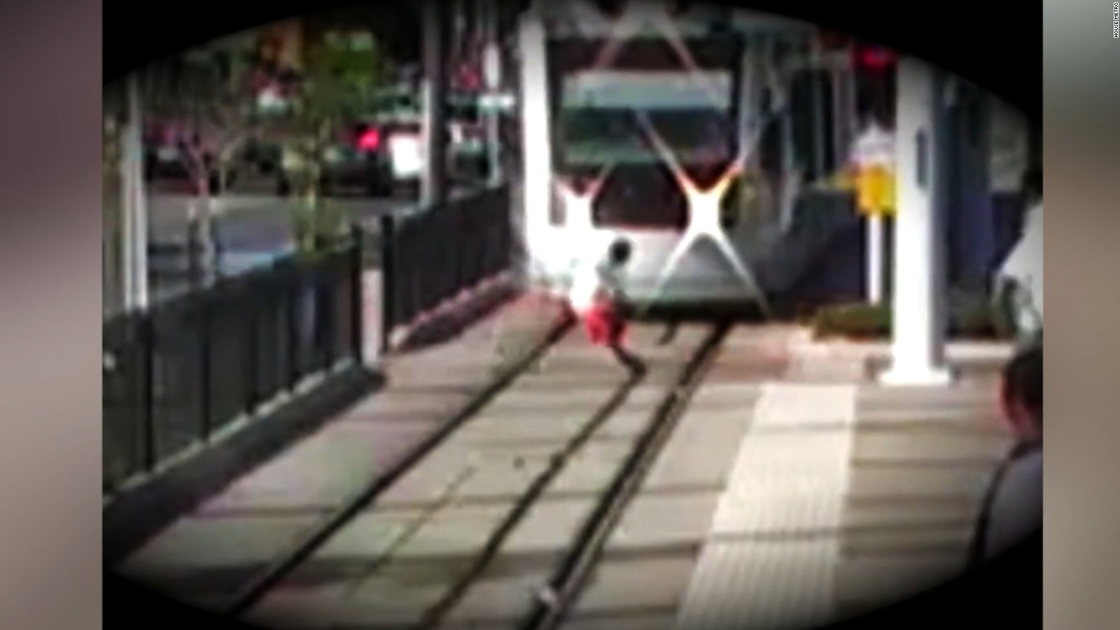 Boy steps into path of oncoming train cnn video