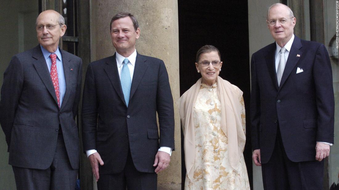 From left, Supreme Court Justices Stephen Breyer, John Roberts, Ginsburg and Anthony Kennedy pose for a photo before meeting with French President Nicolas Sarkozy in Paris in July 2007.