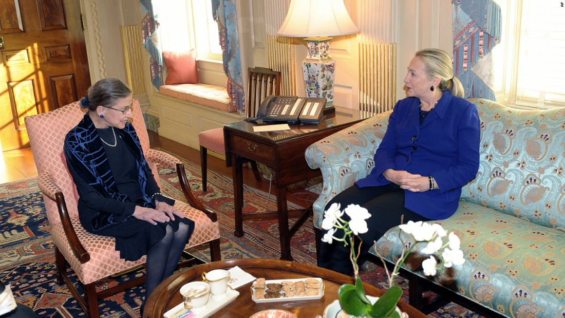 Ginsburg visits with Secretary of State Hillary Clinton at the State Department in Washington in 2012.