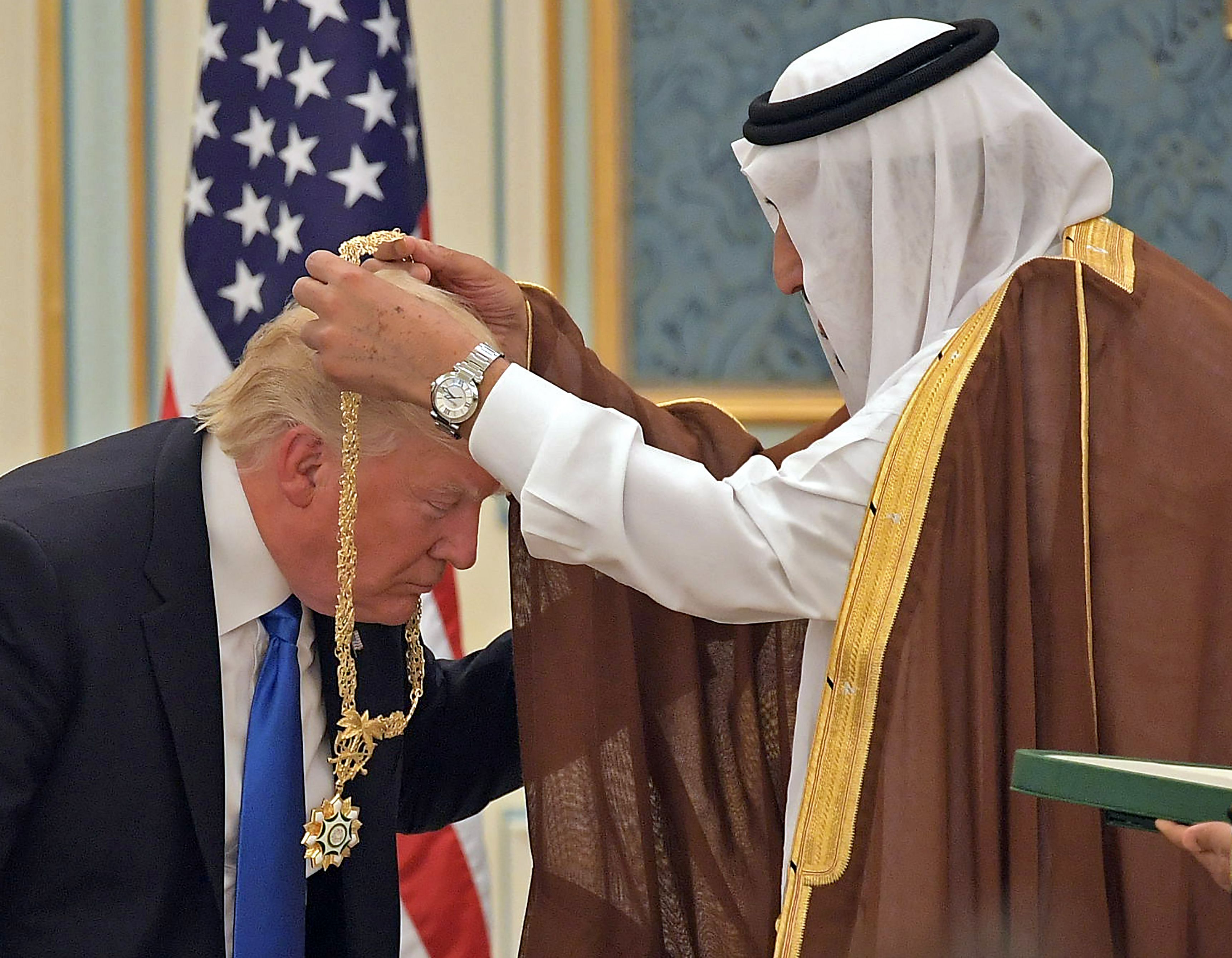 170520112811-trump-saudi-gold-medal.jpg