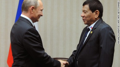 Russian President Vladimir Putin (L) meets Philippines President  Rodrigo Duterte on the sidelines of the APEC Summit in Lima, November 19, 2016. 